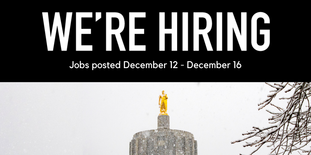 A close up of the gold man on top of the Oregon state capital building in Salem Oregon, with snow falling all around.