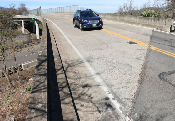 A vehicle passes over the East Main Street Bridge over Interstate 5 in south Ashland 