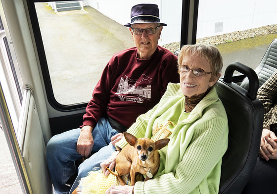 Couple and dog riding LINX bus to Brownsville