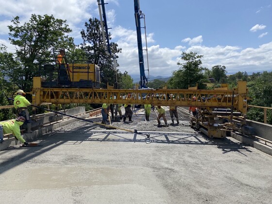 crews pour a new concrete bridge deck on the East Main Street Bridge over Interstate 5 near Ashland 