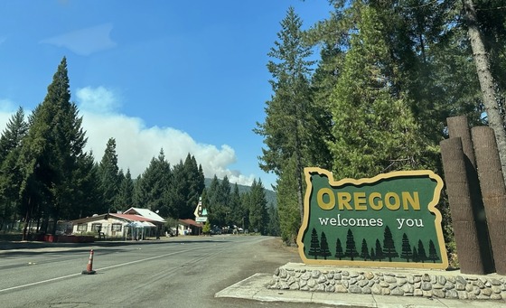 The welcome sign along US-199 at the Oregon-California border