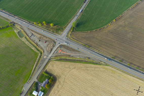 Aerial view of the OR 99W and Clow Corner Road intersection showing construction of the new roundabout