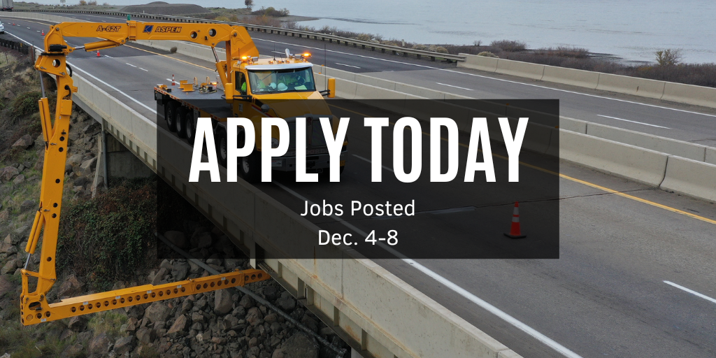 Photo of our under-bridge inspection truck and our crew maintaining the underside of the bridge.
