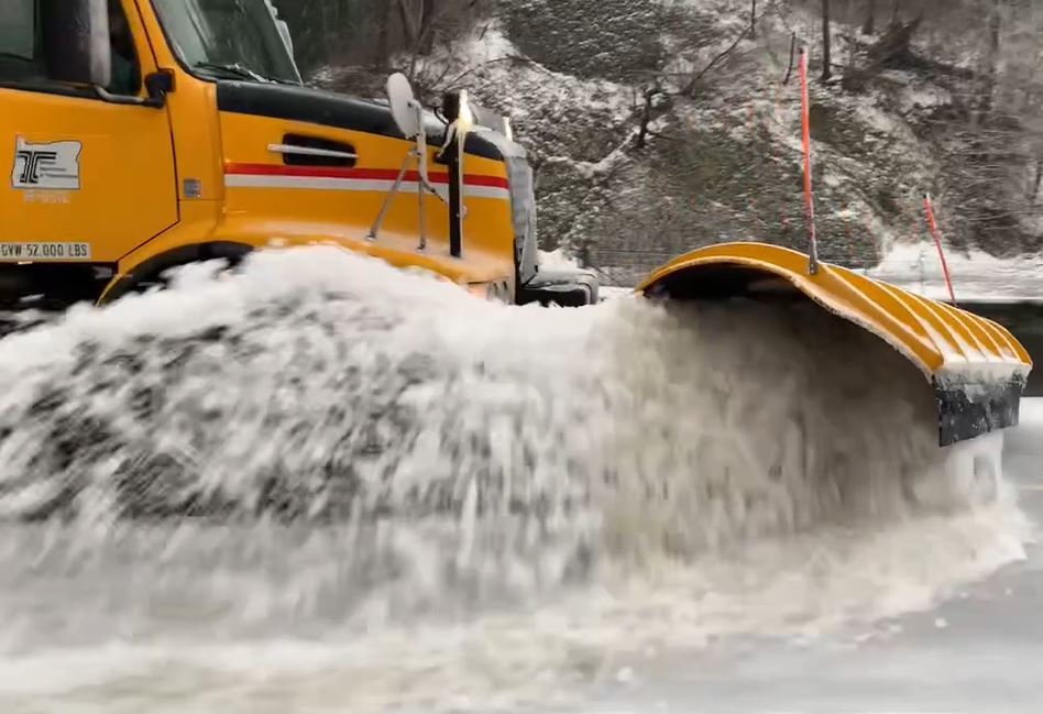 An ODOT truck plows slush, snow and ice off I-84 in the Gorge on Wednesday afternoon. 