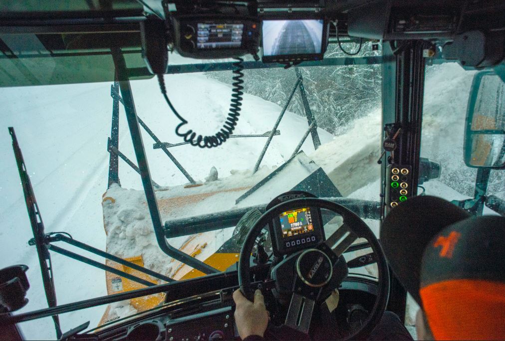 The view from inside of a snow blower.
