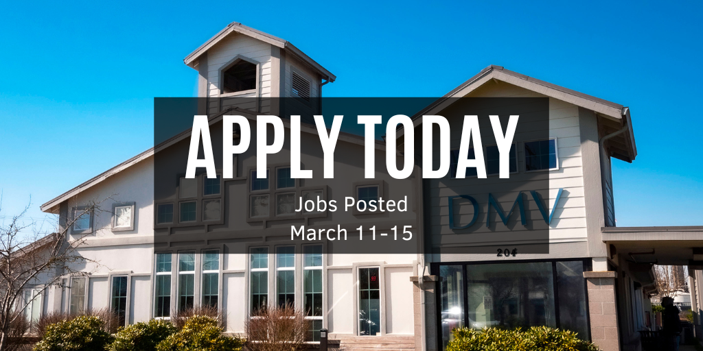 A DMV office with bright crystal blue sky behind it.