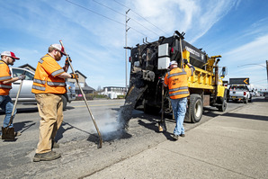 photo showing ODOT crew fill potholes