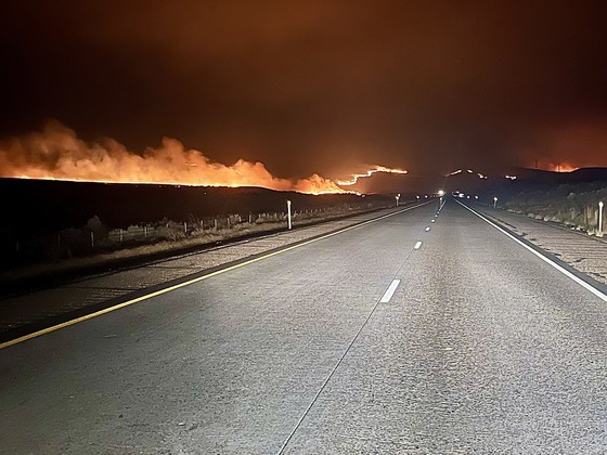 Wildfire burning along I-84 in eastern Oregon.