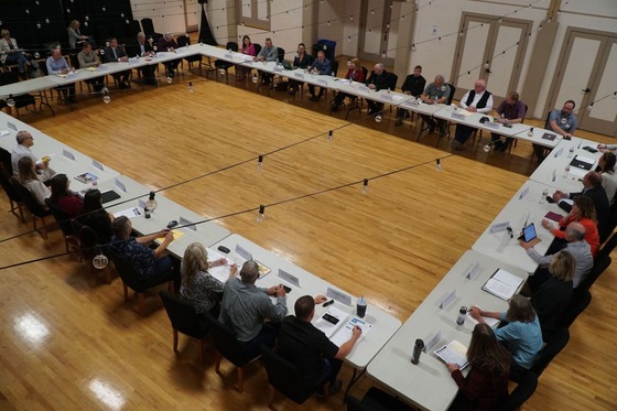 Tables form a large circle, lawmakers, agency partners and ODOT are all seated. 