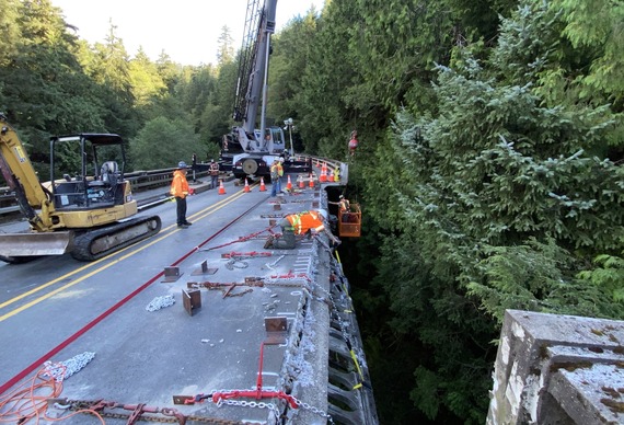 Crew removing the concrete off Necarney Creek Bridge