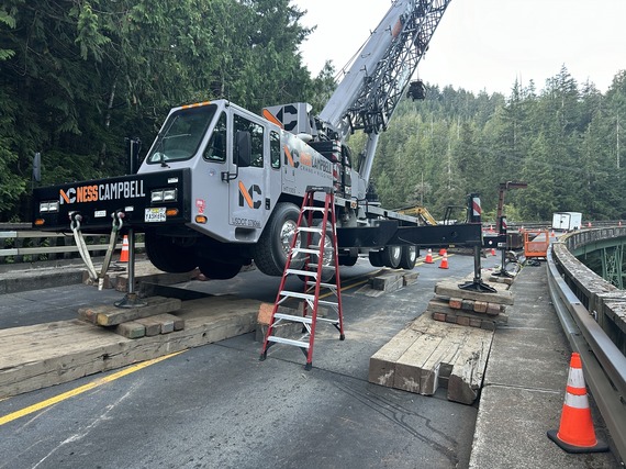 Crane on Necarney Creek Bridge taking up both lanes