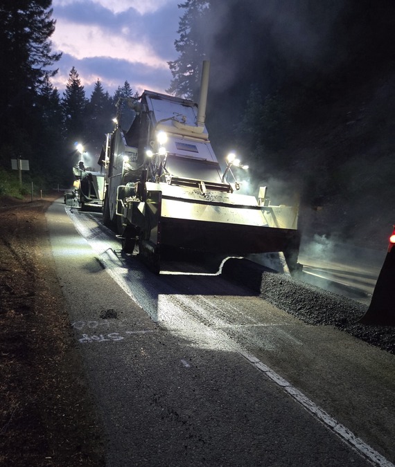 Photo of paving truck at night on OR 58