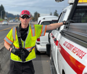 ODOT Incident Responder standing next to his truck