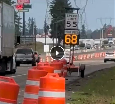 Image of video still showing speed feedback sign higher than posted speed limit of 55 mph