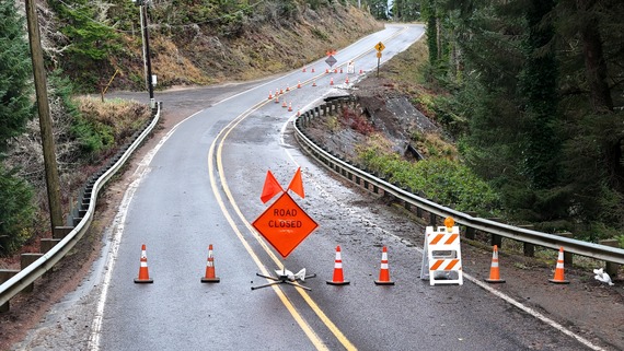Photo showing "road closed sign" on OR 131 at slide