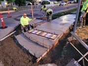 Photo of a curb ramp under construction