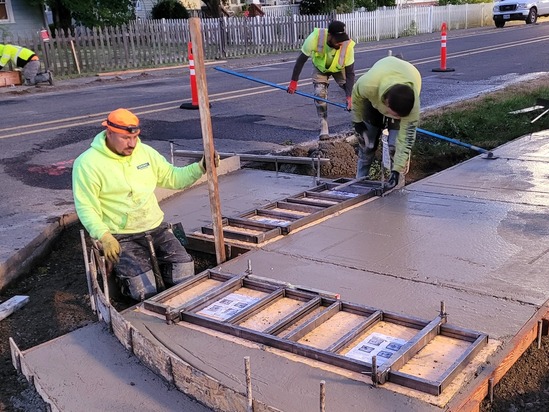 Photo of a curb ramp under construction