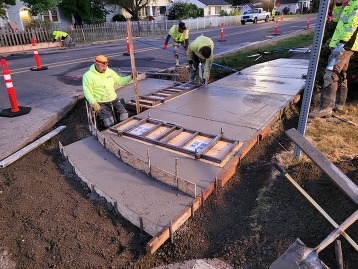 Photo of a curb ramp under construction