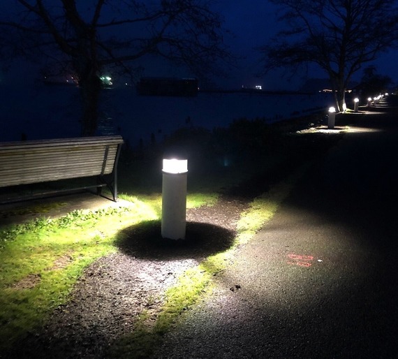 Photo of one of the new lights along the Astoria Riverwalk Trail at night
