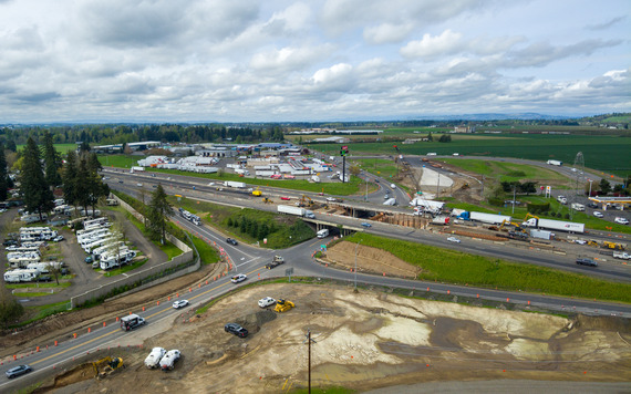 Aerial photo showing the I-5 Auora-Donald Interchange under construction
