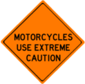 Motorcylces use extreme caution sign