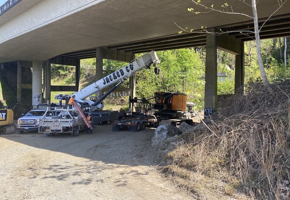 Crews preparing the work site under the McCord Creek bridge.