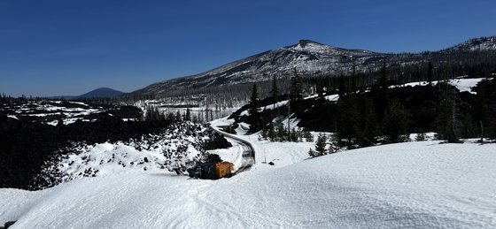 A snow blower clears McKenzie Pass earlier this spring. 