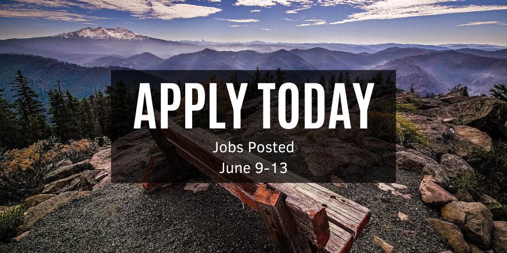 A scenic mountain view at sunrise.