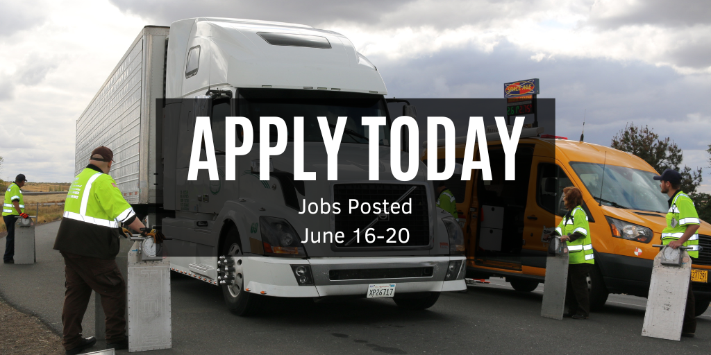 Semi truck and ODOT van parked on roadway with ODOT personnel preparing to complete safety inspection. 