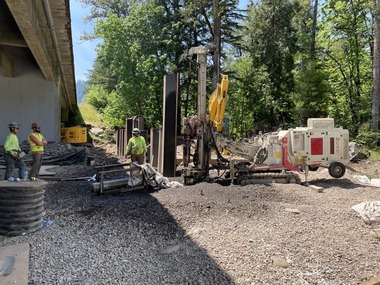 Photo showing work zone at Barnard Bridge where crews are pile driving
