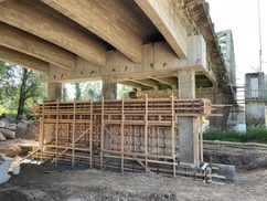 Photo showing construction on the Coast Fork Bridge, reinforcing the pier wall 