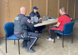 Law enforcement and CCD talk to HHG moving company