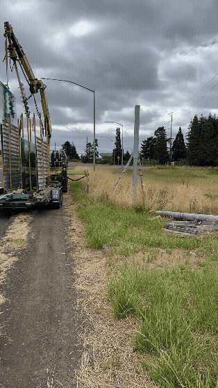 Gif showing a timelapse of a sign being installed on OR 51