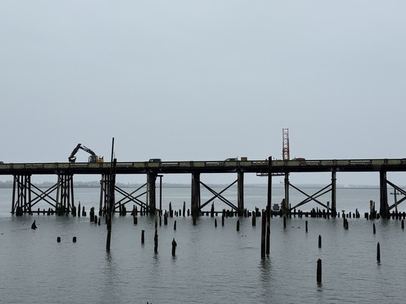Photo of Old Youngs Bay Bridge with construction equipment visible on it