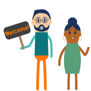 Two people holding a welcome sign