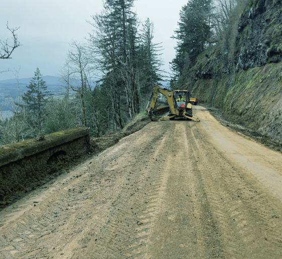Crews work to reopen the highway. 