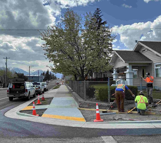 Crews work on curb ramps at Center Street in North Powder
