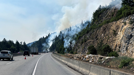 The Neil Creek Fire burns near I-5 south of Ashland in July 2025, prompting a lane closure.