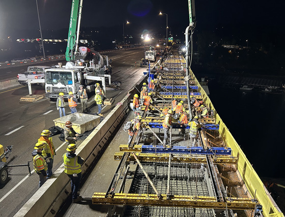 Concrete pouring June 27, 2026, on northbound Abernethy Bridge on Interstate 205.