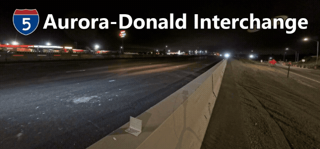 Video footage showing striping being applied to I-5. Text: I-5 Aurora-Donald Interchange