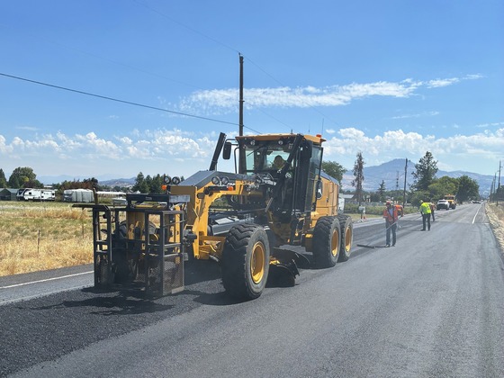 Crews paving OR 238 west of Medford on July 15