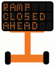 Portable message board sign with text: ramp closed ahead, use caution