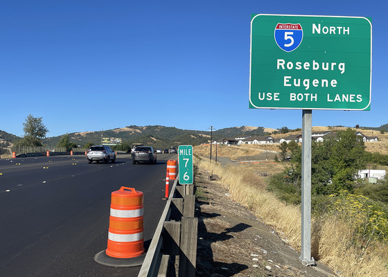 Oregon 42 signs advises drivers to use both lanes
