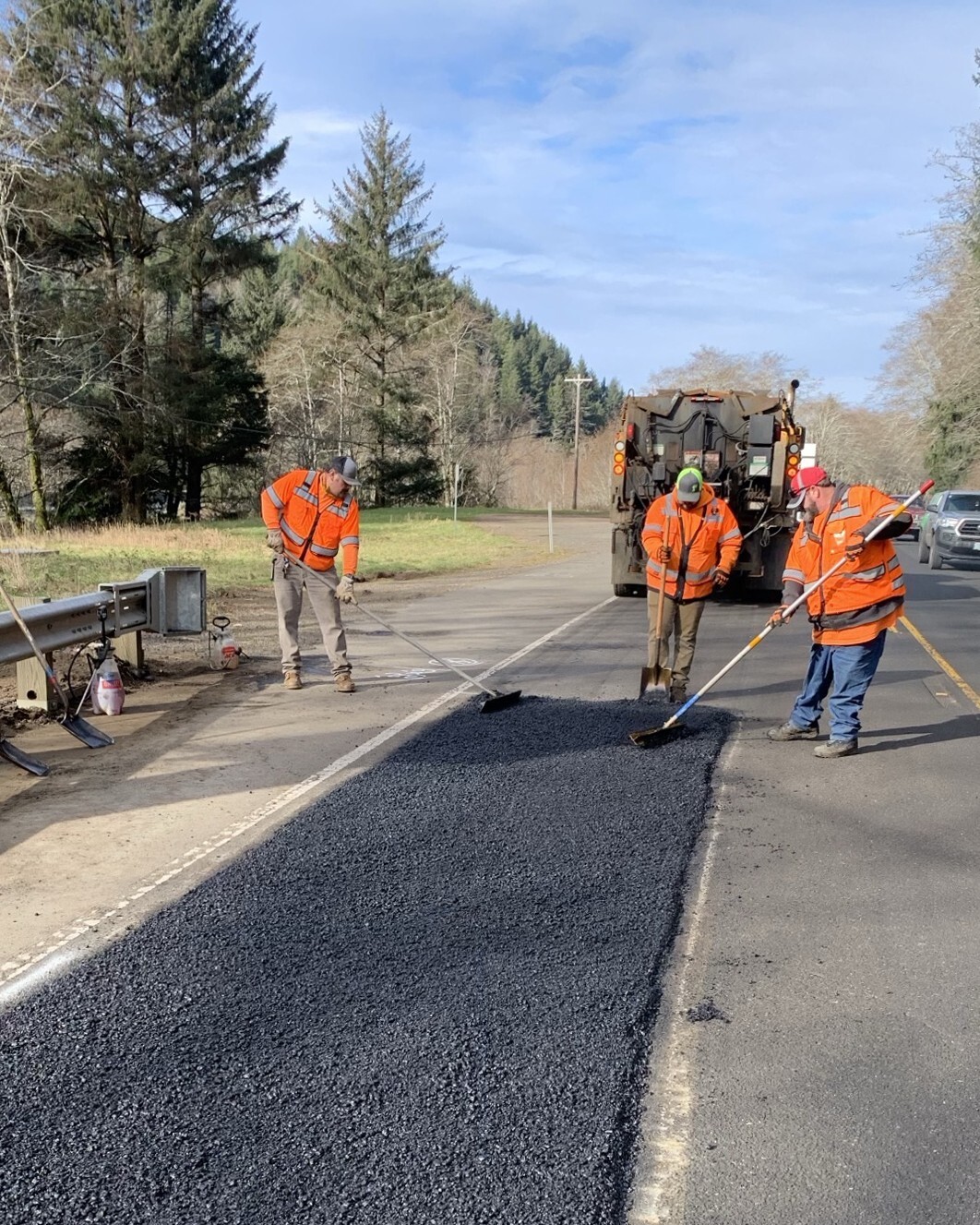 Crews repairing the pavement.