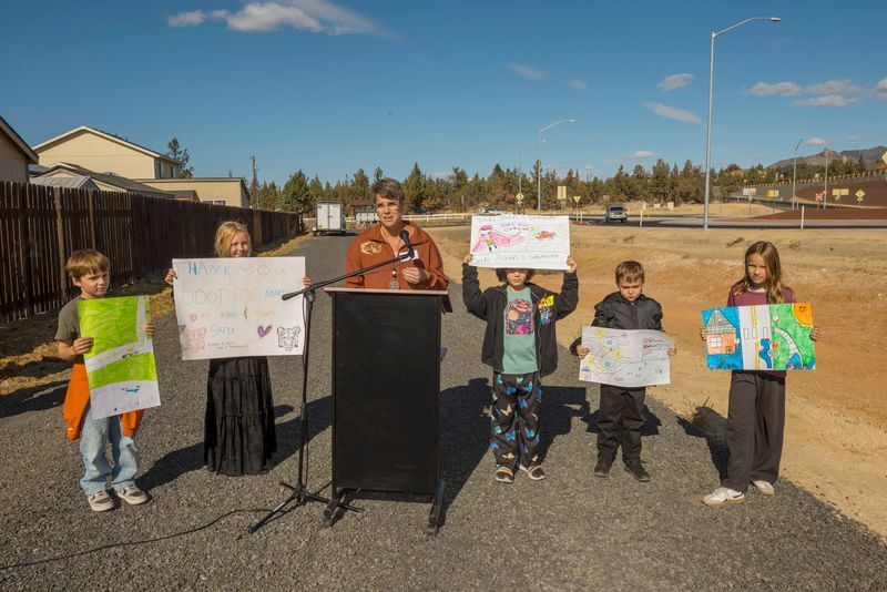 Kids holding posters.
