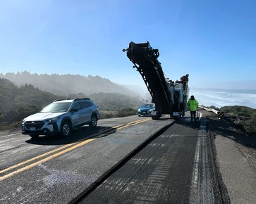 ODOT crews grind uneven pavement on U.S. 101 north of Newport to smooth the road ahead of the rain.