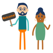 Two people holding welcome sign