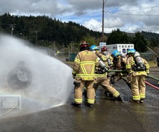 FLAG in North Douglas (Firefighters spraying FLAG prop while being directed by DPSST trainer)