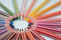 Colored pencils arranged in a circle