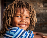 Young boy with locs